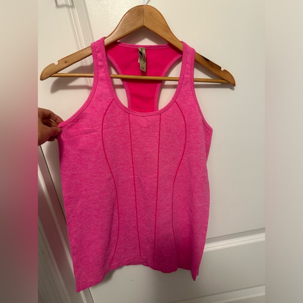 Ebb & Flow hot pink racerback tank. Mesh back detail. Like new. Fits a small